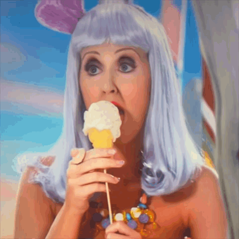 Woman in Purple Wig Eating Ice Cream