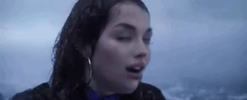 Woman In Rain Eyes Closed Wet Hair GIF