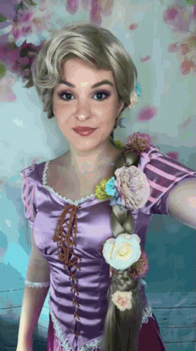 Woman in Rapunzel Costume With Flowers in Hair