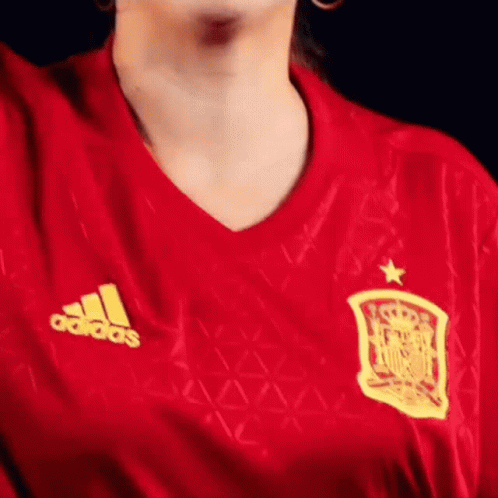 Woman in Red Adidas Shirt Yellow Star
