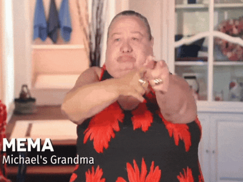 Woman In Red And Black Dress Named Mema GIF