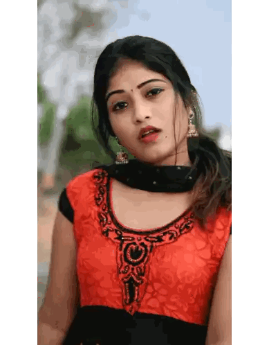 Woman in Red and Black Dress