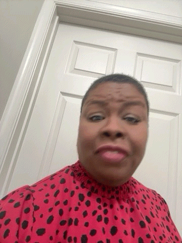 Woman in Red and Black Polka Dot Shirt Funny Face