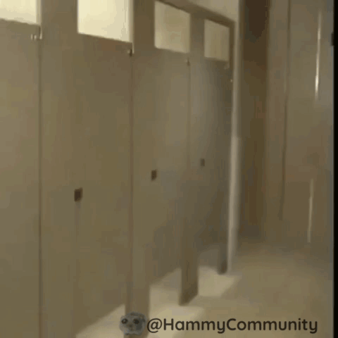 Woman in Red and Girl in Yellow in Restroom