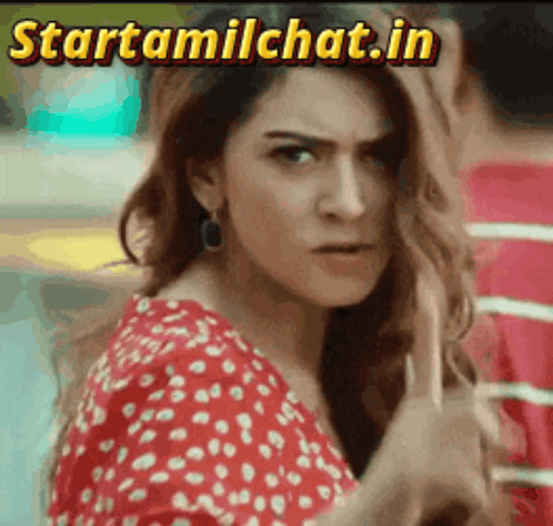 Woman in Red and White Polka Dot Dress Looking at Camera Startamilchat.in