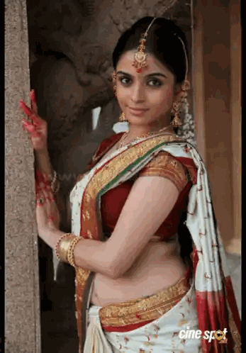 Woman in Red and White Saree