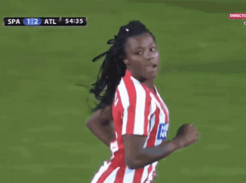 Woman in Red and White Striped Herbalife Shirt