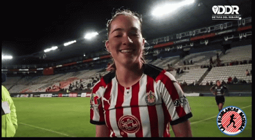 Woman in Red and White Striped Shirt