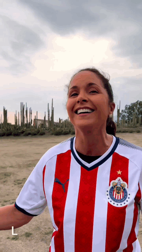 Woman in Red and White Striped Shirt with Star