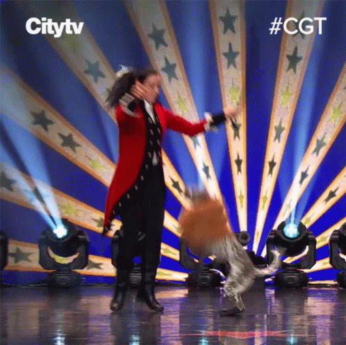 Woman in Red Coat Dancing with Dog Citytv Logo