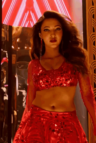 Woman In Red Crop Top And Skirt GIF
