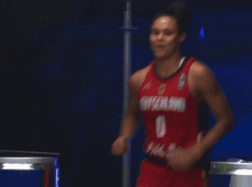 Woman in Red Deutschland Jersey Running