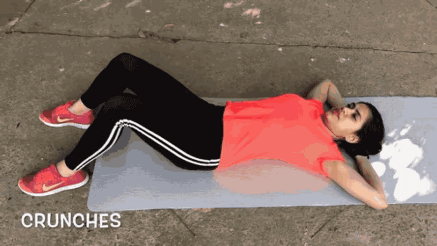 Woman In Red Doing Crunches Exercise GIF