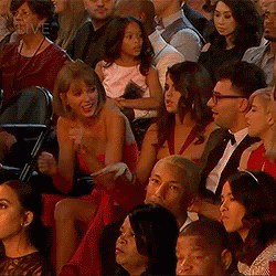 Woman in Red Dress at Concert