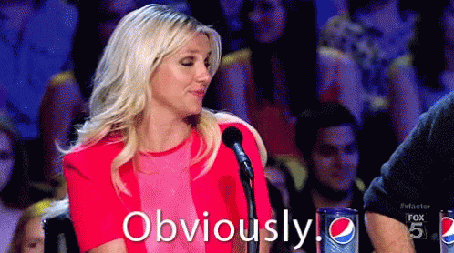 Woman In Red Dress At Microphone Says Obviously GIF