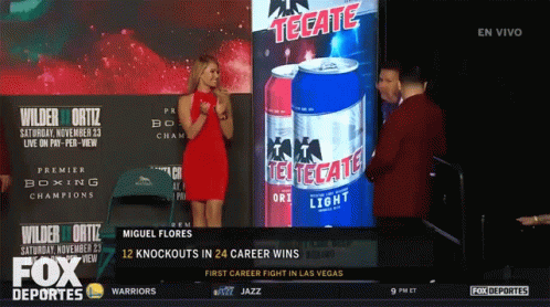 Woman In Red Dress At Tecate Sign GIF