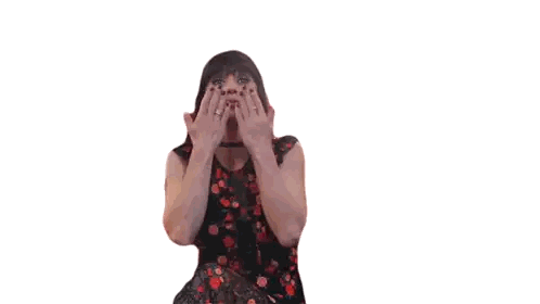 Woman in Red Dress Covering Face