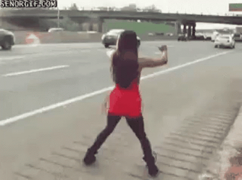 Woman in Red Dress Dancing