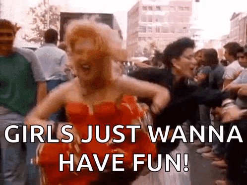 Woman in Red Dress Dancing Girls Just Wanna Have Fun
