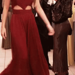 Woman in Red Dress Dancing with Man in Black
