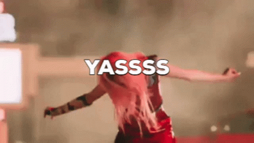 Woman in Red Dress Dancing Yasssss Sign
