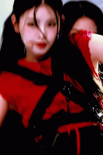 Woman in Red Dress Holding Microphone in Mouth
