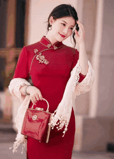 Woman in Red Dress Holding Red Bag