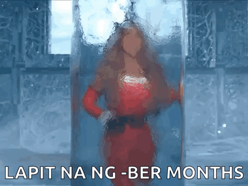 Woman in Red Dress in Glass Box Saying Lapit Na Ng-Ber Months