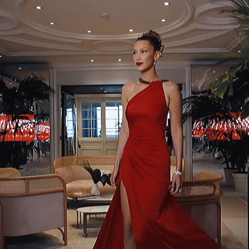 Woman in Red Dress in Room