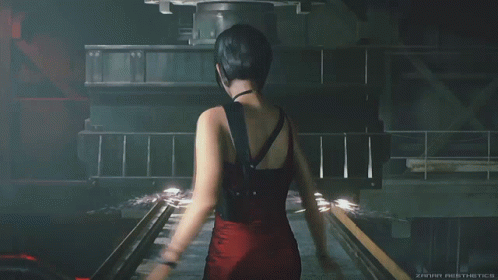 Woman in Red Dress Running Through Dark Room