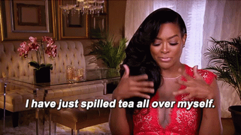 Woman In Red Dress Saying I Just Spilled Tea All Over Myself GIF