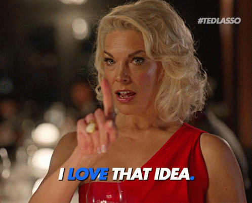 Woman In Red Dress Saying I Love That Idea With Finger GIF
