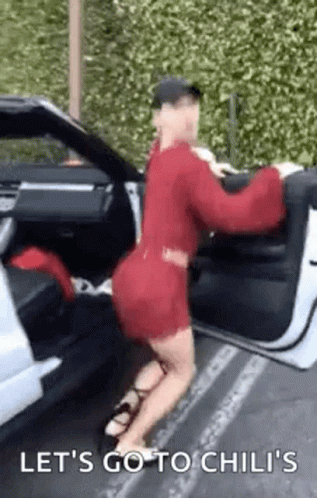 Woman in Red Dress Saying Let's Go to Chili's