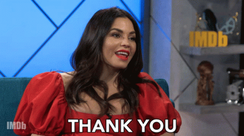 Woman in Red Dress Saying Thank You on IMDb