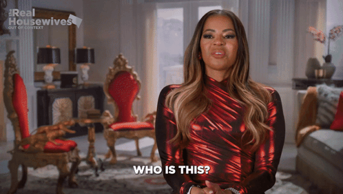 Woman in Red Dress Saying Who Is This