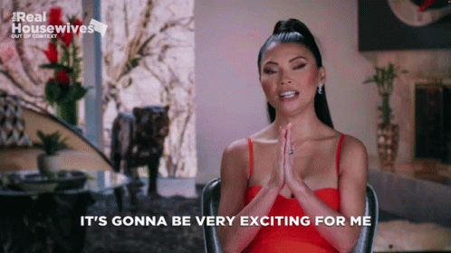 Woman in Red Dress Says It's Gonna Be Very Exciting