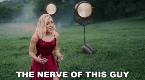Woman in Red Dress Singing The Nerve Of This Guy