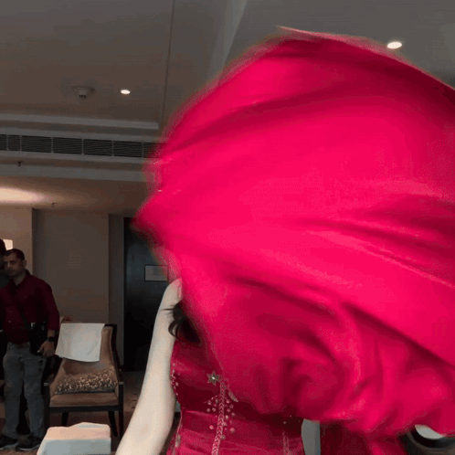 Woman In Red Dress Smiling And Waving Red Cloth GIF