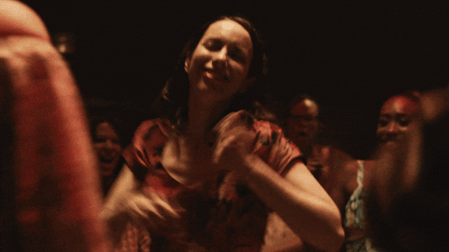 Woman In Red Dress Smiling Dancing GIF