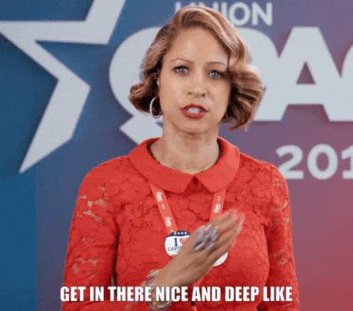 Woman In Red Dress With I Care Lanyard GIF