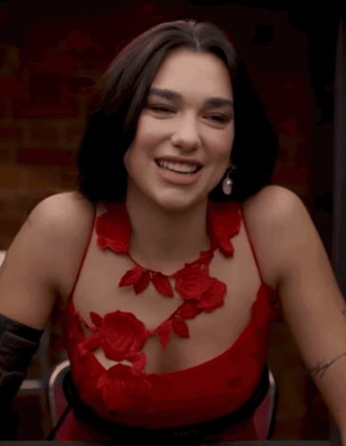 Woman in Red Dress With Roses