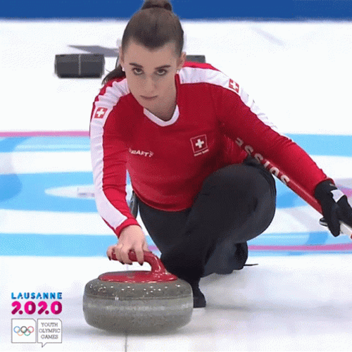 Woman In Red Focused Curling GIF