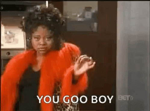 Woman in Red Fur Coat Saying You Goo Boy