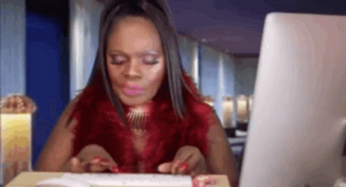 Woman in Red Fur Coat Typing