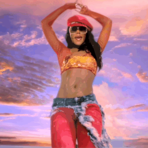 Woman in Red Hat Dancing on Beach