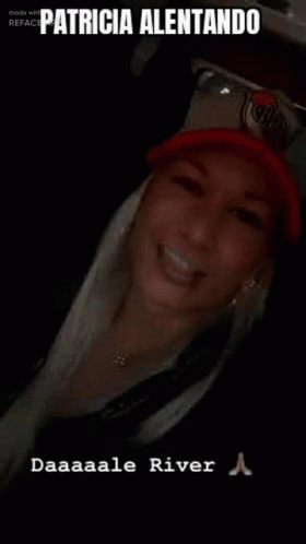Woman in Red Hat Smiling