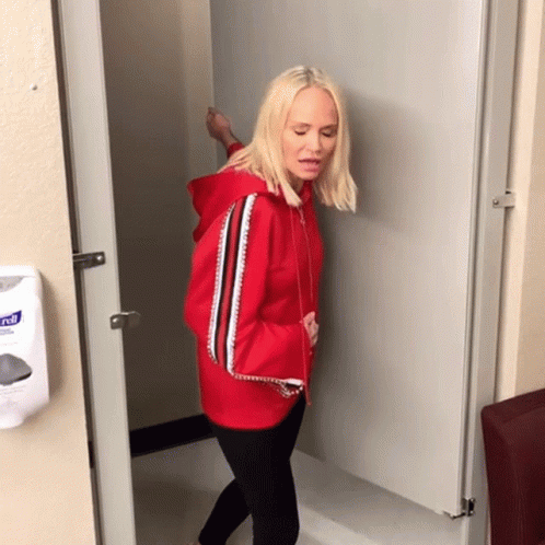 Woman in Red Hoodie at Kleenex Hand Sanitizer