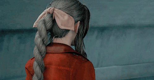 Woman in Red Jacket and Necklace