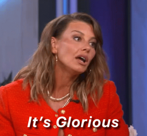 Woman in Red Jacket It's Glorious
