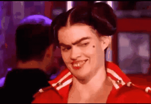 Woman in Red Jacket Making Funny Face